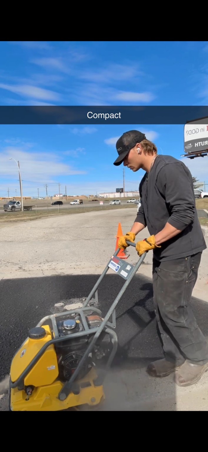 Wolf Contracting asphalt repair work Calgary